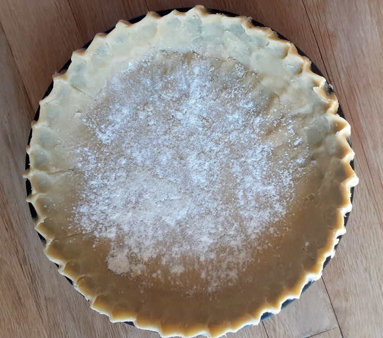 Unbaked finished pie crust.