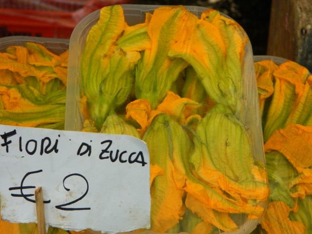 Squash blossoms for sale at market, photo credit: Seeds of Italy.